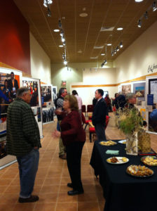 Community members gather at Why Treaties Matter exhibit at the Edge Center in Bigfork